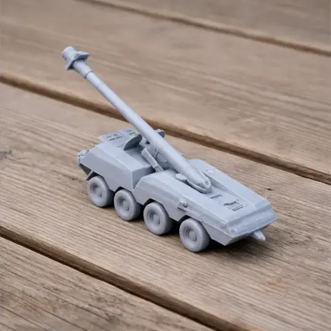 3D printed model of a 152 mm DANA self-propelled howitzer on a wooden surface.