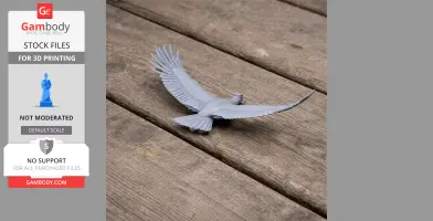 3D printed model of an Andean Condor with wings spread, placed on a wooden surface.