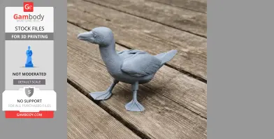 A 3D-printed grey model of a bird with webbed feet standing on a wooden surface.