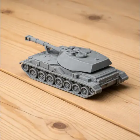 Gray 3D-printed model of a military tank with detailed features, placed on a wooden surface.
