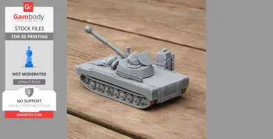 A detailed gray 3D-printed model of a 2S1 Gvozdika tank on a wooden surface.