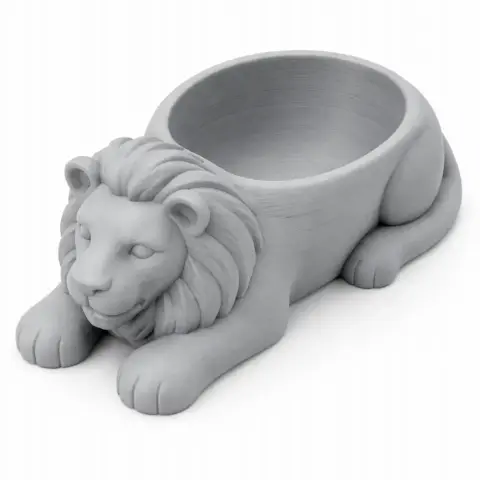 3D-printable lion-shaped bowl with intricate mane details, designed as a decorative wall hook.