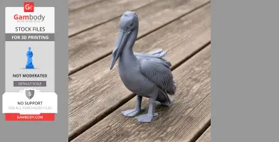 Gray 3D-printed model of a great white pelican standing on a wooden surface.