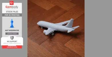 A 3D printed scale model of an Airbus A220 airplane on a wooden floor.