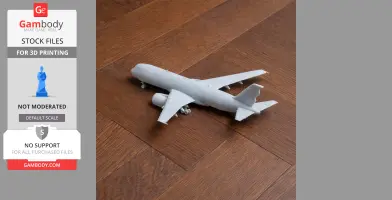 A white 3D-printed Airbus A350 model on a wooden surface, viewed from above.