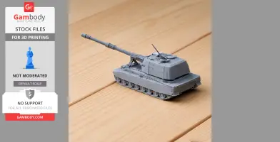 Gray 3D-printed model of a tank on a wooden surface.