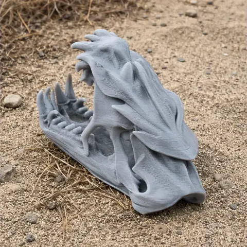 3D-printed Atlantic Marlin skull replica, detailed design, resting on a sandy surface.