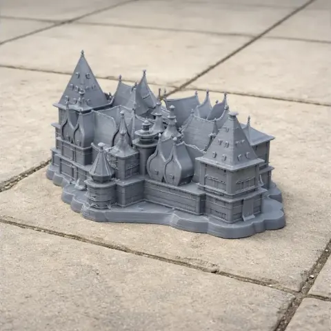 Intricate 3D-printed model of a fantasy palace with spired roofs and detailed architecture.