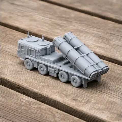 Gray 3D-printed model of a missile launching vehicle with multiple cylindrical launch tubes.