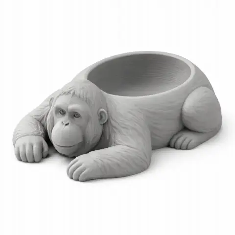 3D model of an orangutan-shaped bowl with detailed fur texture and a hollow back.