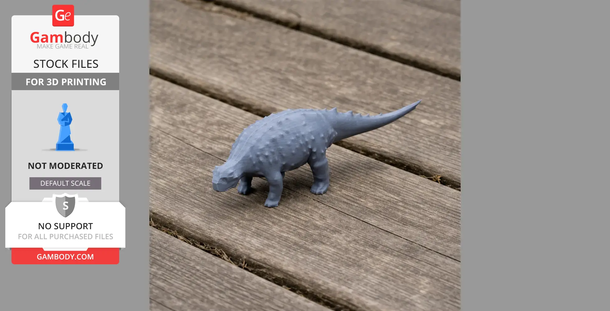 A gray 3D-printed model of a Minmi, a small armored dinosaur, displayed on a wooden surface.
