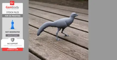 A 3D printed Mononykus model on a wooden surface, showcasing its realistic details.