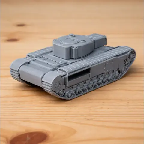 Gray 3D-printed model of an A22 tank with detailed tracks and turret on a wooden surface.