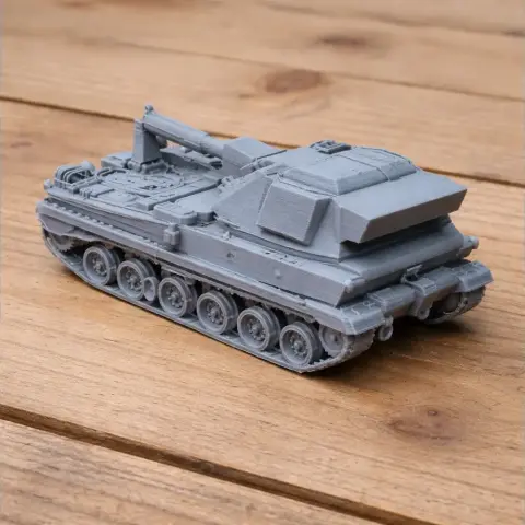 Detailed 3D-printed model of an AHS Krab tank on a wooden surface.