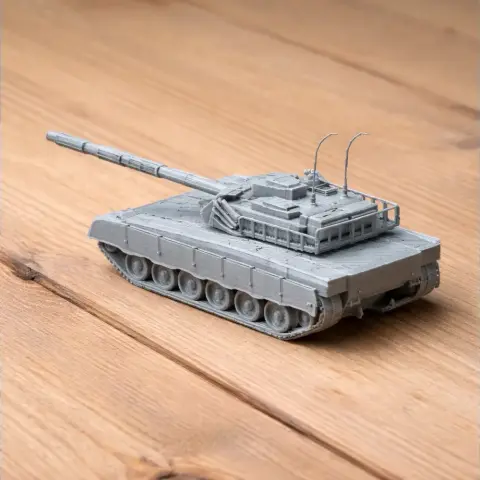 3D-printed Al-Khalid tank model in grey, displayed on a wooden surface.