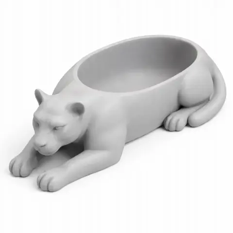 A 3D-printed panther-shaped bowl, ideal for use as a decorative wall hook.