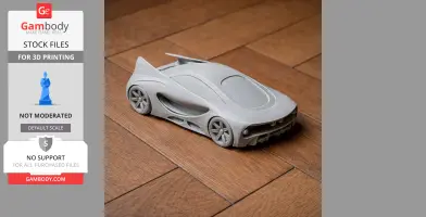 3D printed model of a sleek, futuristic Alfa Romeo BAT concept car on a wooden floor.