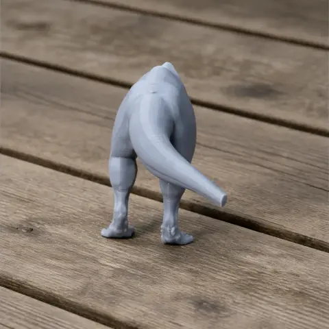 3D printed model of a Nanyangosaurus dinosaur, missing head and upper body, on a wooden surface.