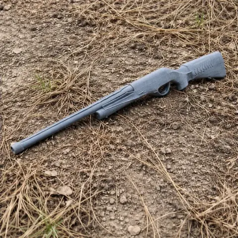 A detailed 3D-printed prop of a Benelli Vinci shotgun, placed on dry, grassy ground.