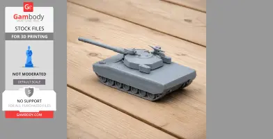 A 3D printed model of an ASCOD tank in gray, displayed on a wooden surface.