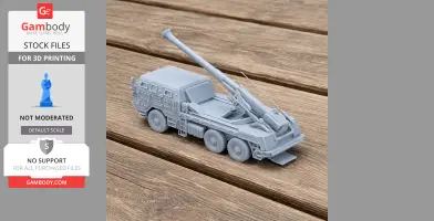 Gray 3D-printed model of a six-wheeled tank with a long cannon on a wooden surface.