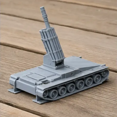 3D-printed model of a Batignolles Chatillon 155 mm tank on wooden surface.