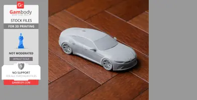 3D-printed Alfa Romeo Giulia model on a wooden surface.