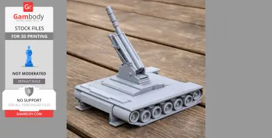 Gray 3D-printed tank model with detailed tracks and an elevated barrel on a wooden surface.