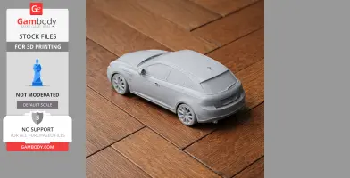 3D printed model of an Alfa Romeo Giulietta car on a wooden floor.