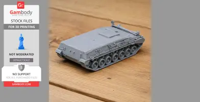 Gray 3D-printed model of a Begleitpanzer 57 tank on a wooden surface.
