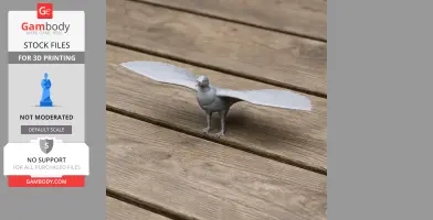 3D printed model of a New World vulture with open wings, displayed on a wooden surface.