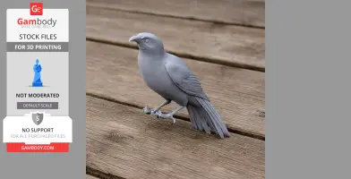 Gray 3D-printed model of a New Zealand Wattlebird on wooden surface.
