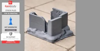 A 3D-printed model of an old, partially ruined tower with textured walls.