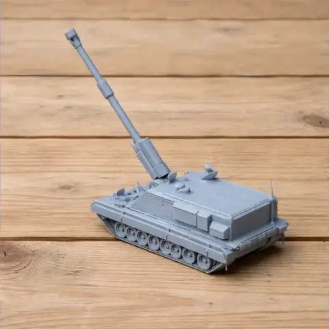 A detailed 3D-printed model of the Bhim self-propelled howitzer on a wooden surface.