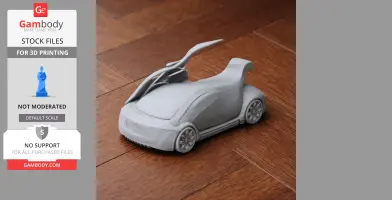 3D-printed model of a futuristic car with raised scissor doors on a wooden surface.