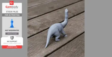 A 3D-printed model of a long-necked dinosaur on a wooden surface.