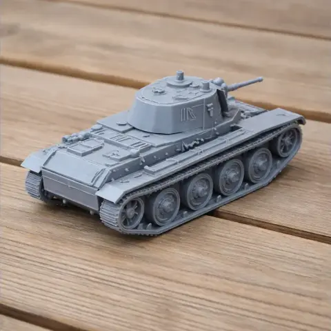 3D-printed model of a BT tank with detailed wheels and turret, displayed on a wooden surface.