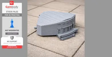 3D-printed architectural model resembling a curved building facade on tiled ground.