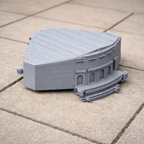 Gray 3D-printed architectural model featuring a curved facade with arches and steps.