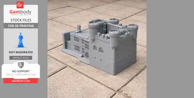 3D-printed model of Belsay Castle with towers and detailed architecture, placed on a paved surface.