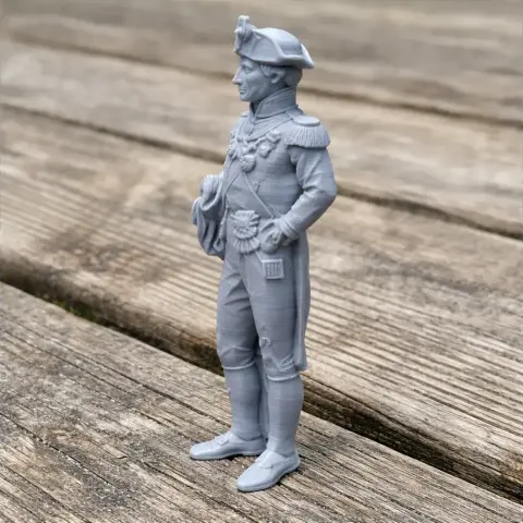 3D model of a Napoleonic-era soldier in uniform and tricorn hat, standing with hands on hips.