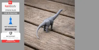 Gray 3D-printed model of a Pakisaurus dinosaur with a long neck and tail on wooden surface.