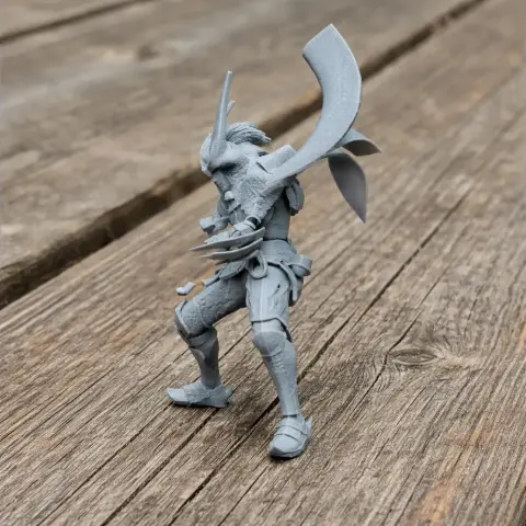 3D-printed samurai figure in dynamic pose with traditional armor and large headpiece, on a wooden surface.