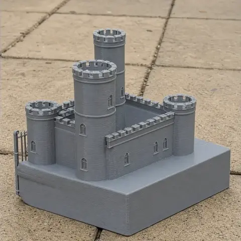 Gray 3D-printed model of Barnstaple Castle with four round towers on a square base.