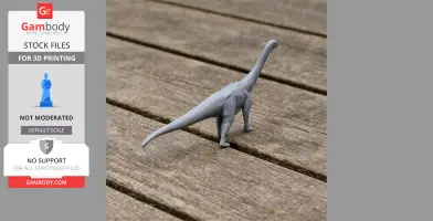 A 3D printed model of a Patagosaurus dinosaur on a wooden surface.
