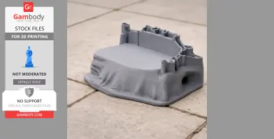 3D printed model of a castle on a rocky base, featuring towers and walls.