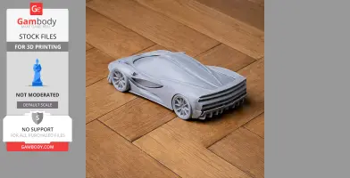 3D printed Apollo Arrow model car on a wooden surface.