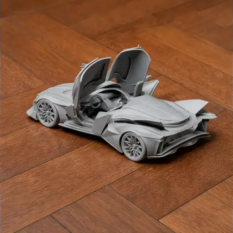 3D-printed scale model of a sleek sports car with butterfly doors open, on a wooden floor.