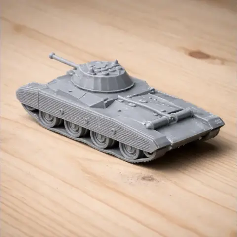A detailed 3D-printed model of a tank with turret and barrel, displayed on a wooden surface.