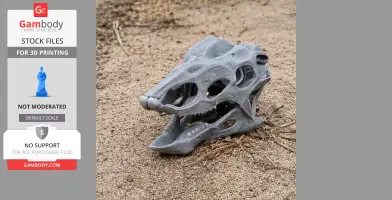 A detailed 3D-printed Desmatosuchus skull replica resting on sandy ground.
